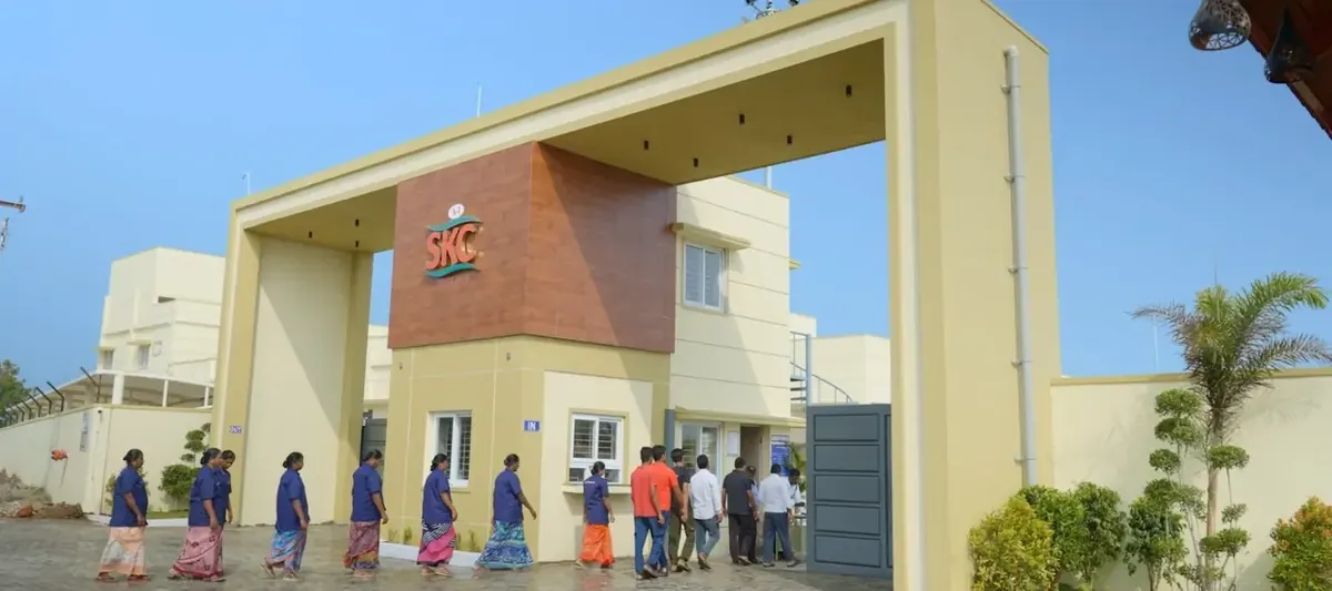 A1 SKC facility entrance gate with staff