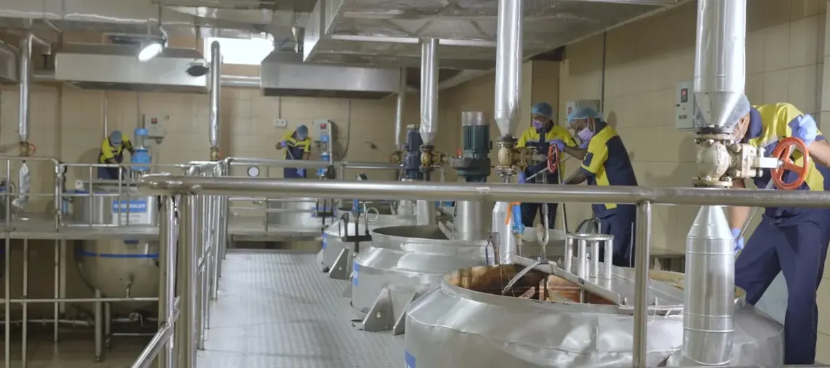 Ghee processing hall with heated kettles